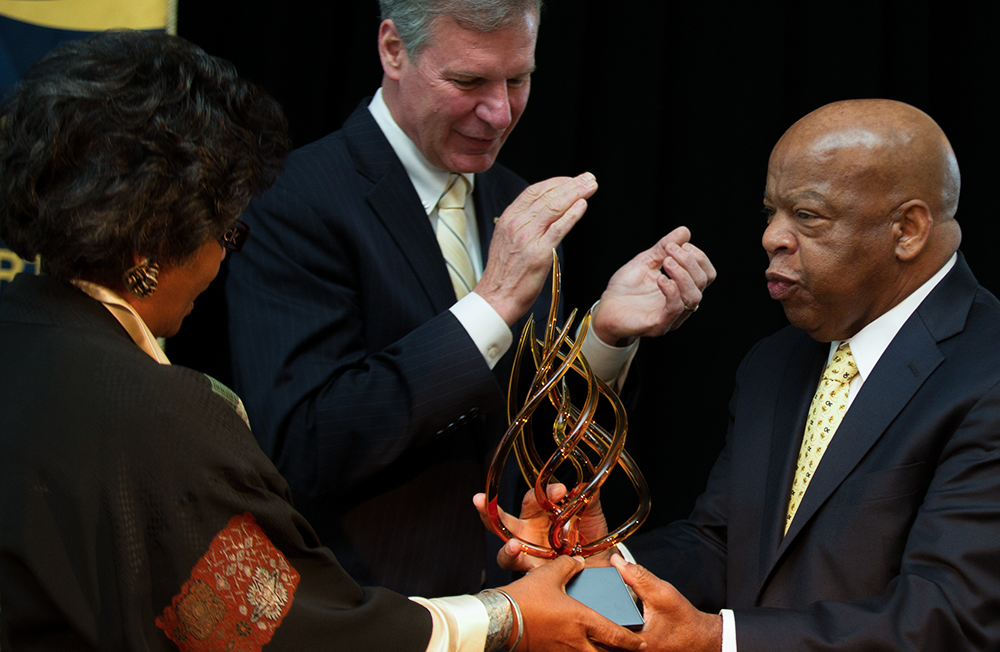 Jacqueline Royster and G. P. "Bud" Peterson presents John Lewis with the Ivan Allen Jr. Prize for Social Courage on April 4, 2013.